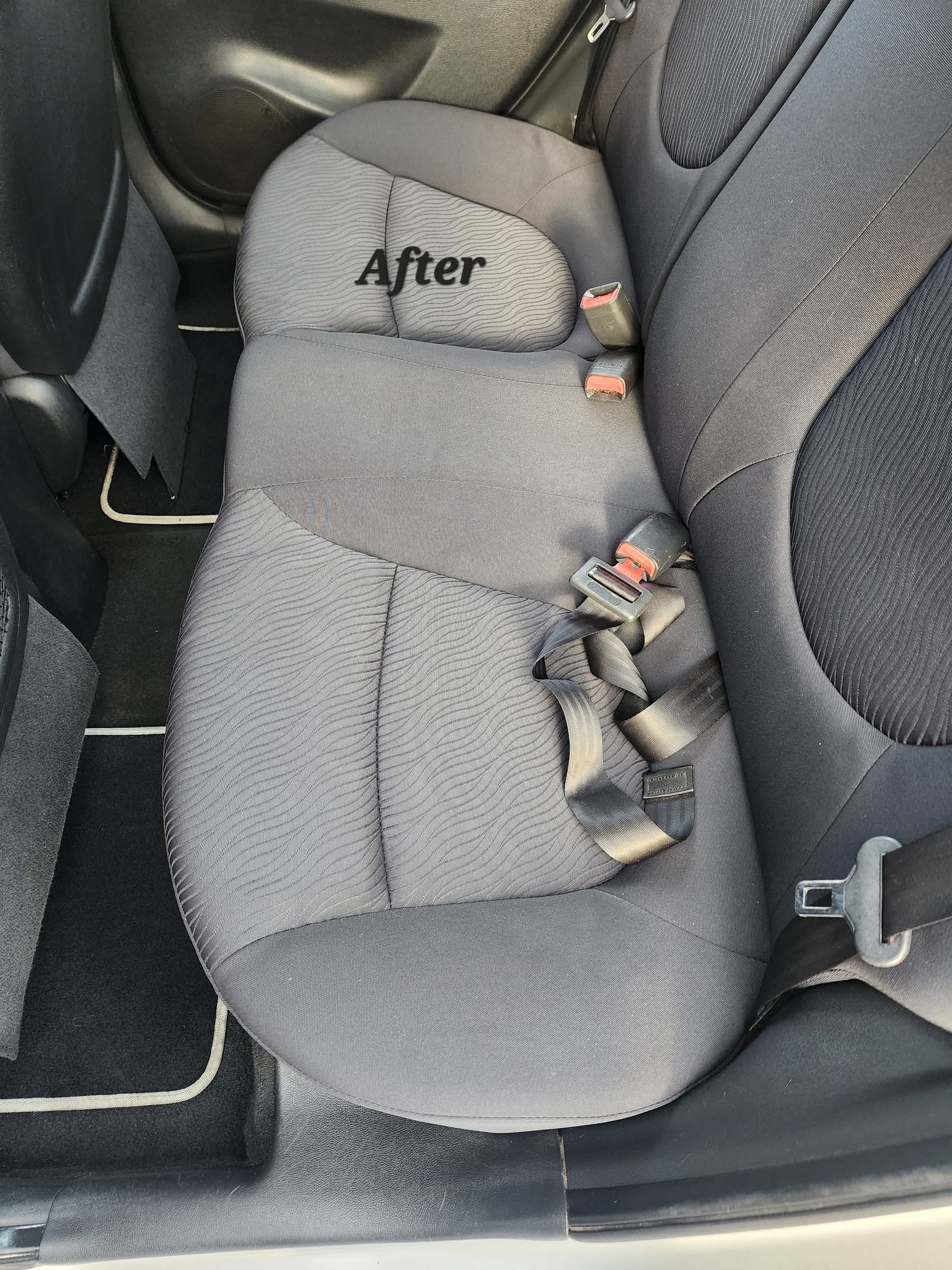 Car back seat after interior cleaning service