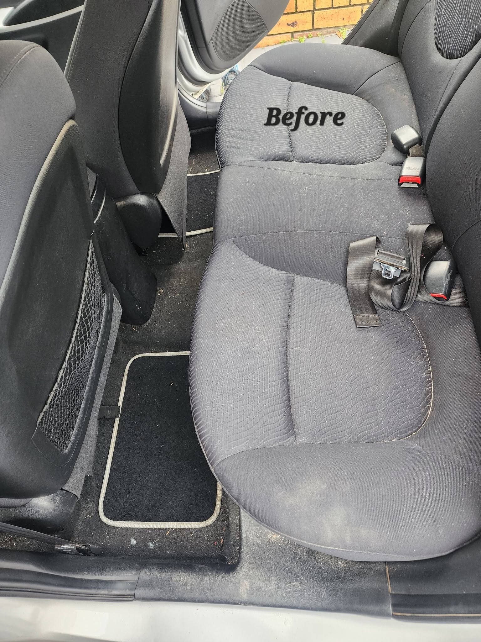 Car back seat before interior cleaning service