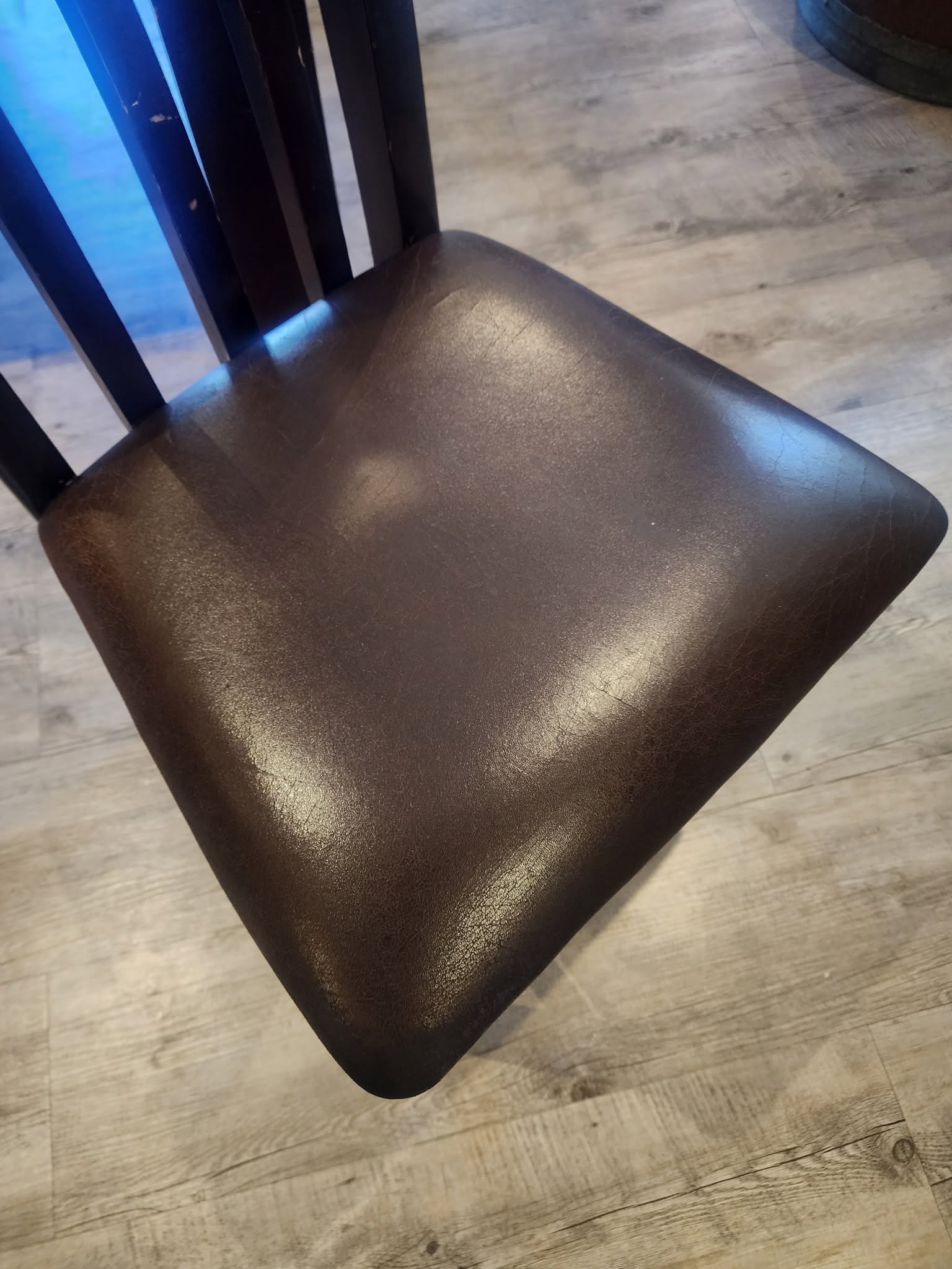 Leather dining chair after professional cleaning service
