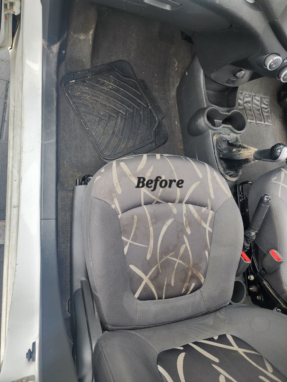 Patterned fabric seat before upholstery cleaning