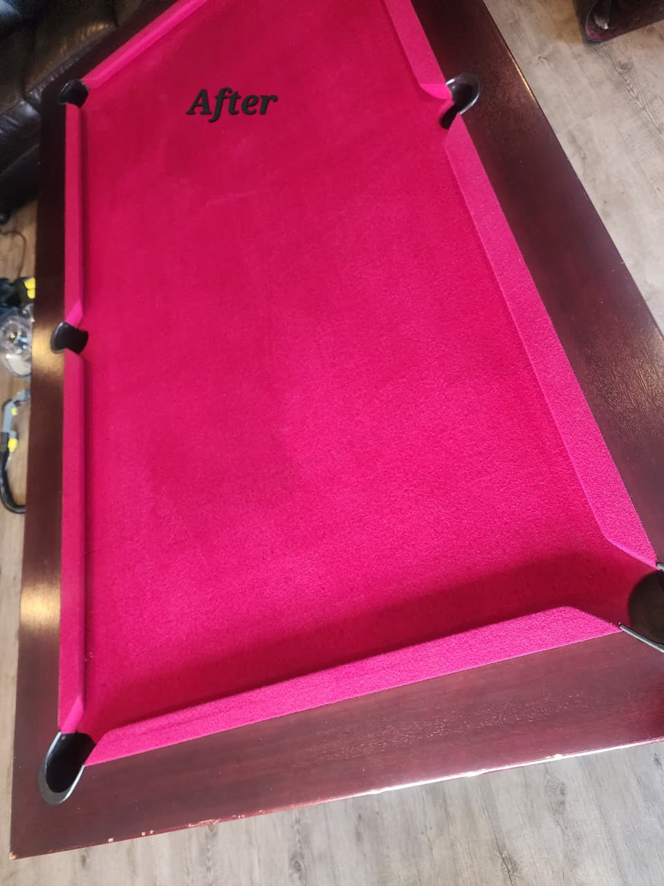 Pool table felt after professional cleaning and restoration